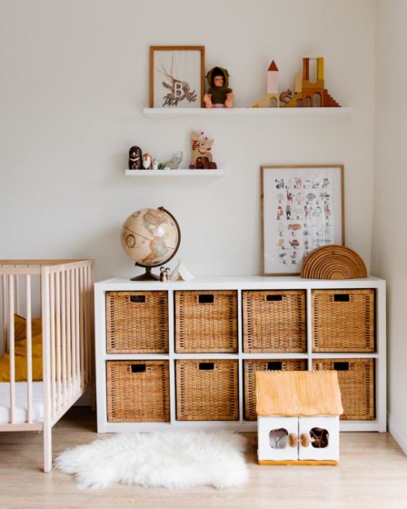 floating shelves in children bedroom with wooden furniture and toys