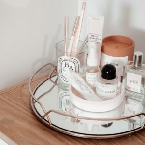 makeup set with tray in bathroom